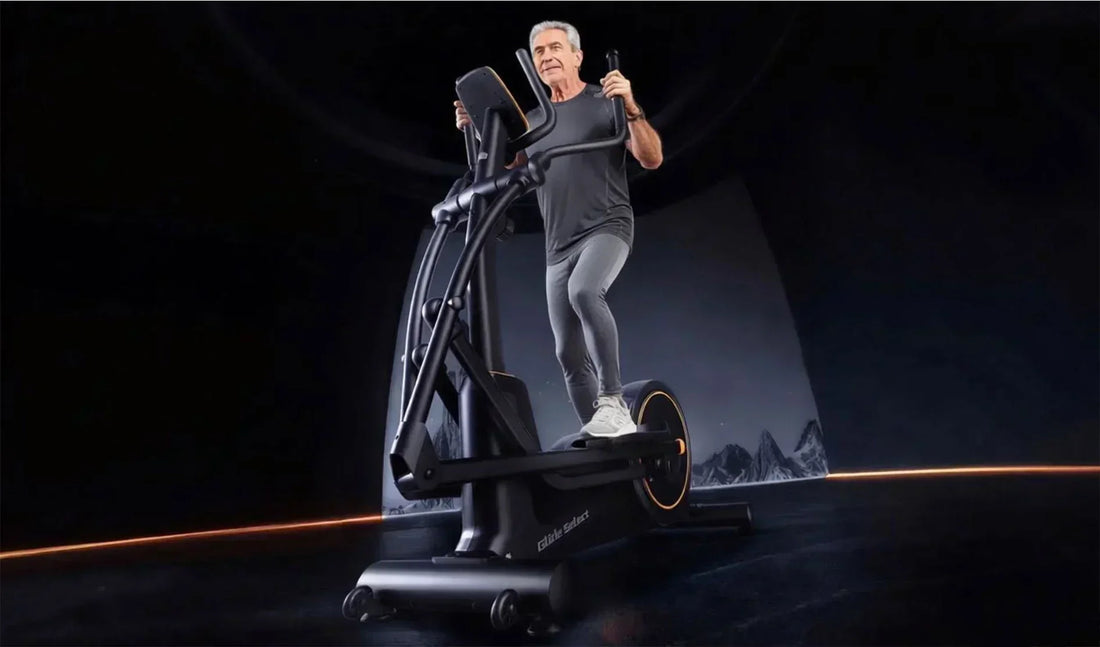 A senior is exercising on an elliptical machine