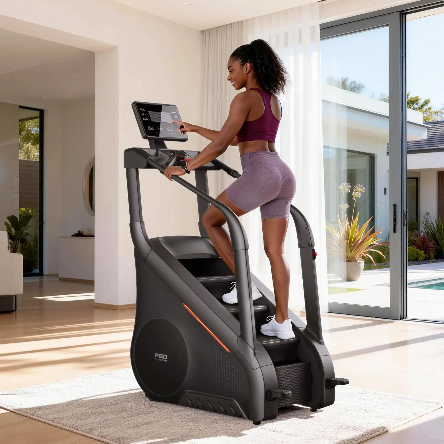 Woman using a stair stepper machine in a modern home setting