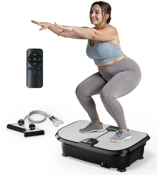 Woman using a vibration plate with a remote control and resistance bands on a white background