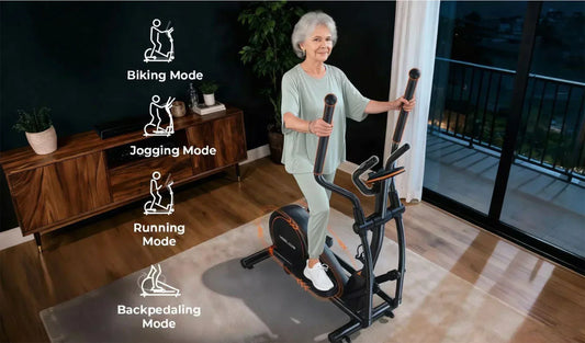 A senior is exercising on an elliptical machine