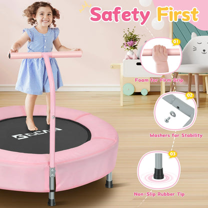 Child on a pink trampoline with safety features highlighted, including foam handle grip, washers for stability, and non-slip rubber tip.