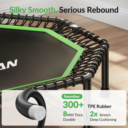 Green and black trampoline with TPE rubber details on a wooden floor.