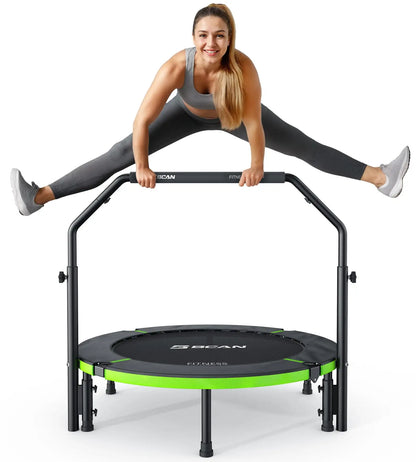 Woman performing a split on a green and black exercise trampoline with 'G-Scan' branding.