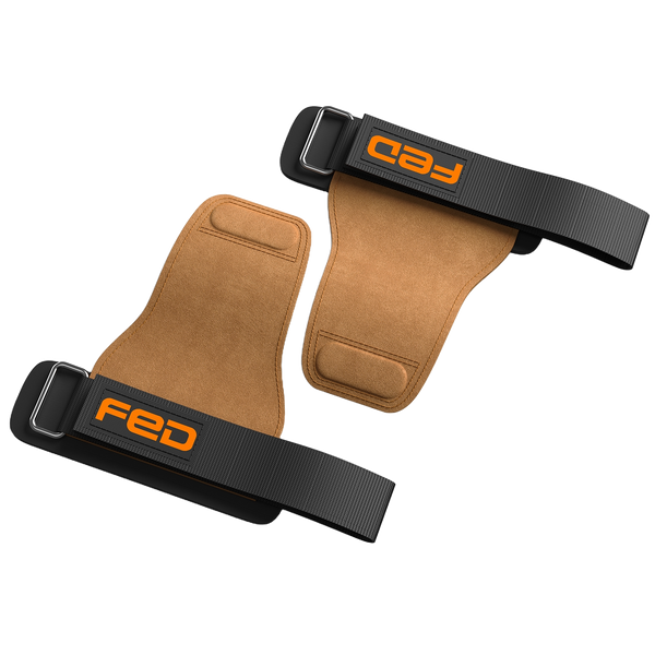 Pair of brown wrist wraps with black straps featuring 'FED' logo on a white background