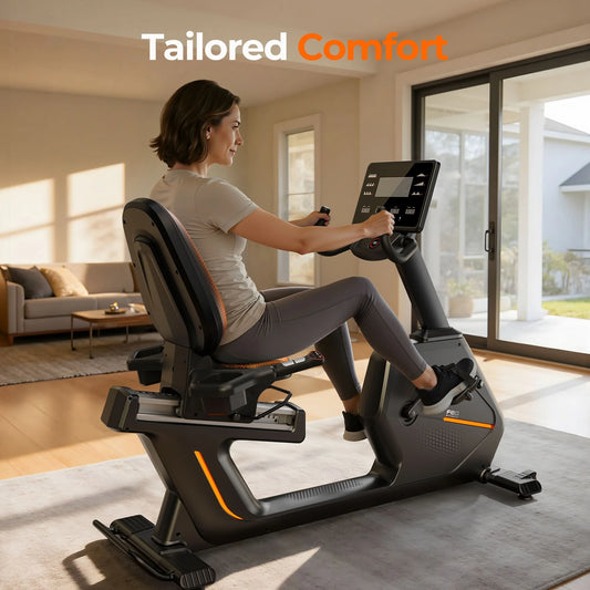 Woman exercising on a recumbent bike in a home setting with 'Tailored Comfort' branding.
