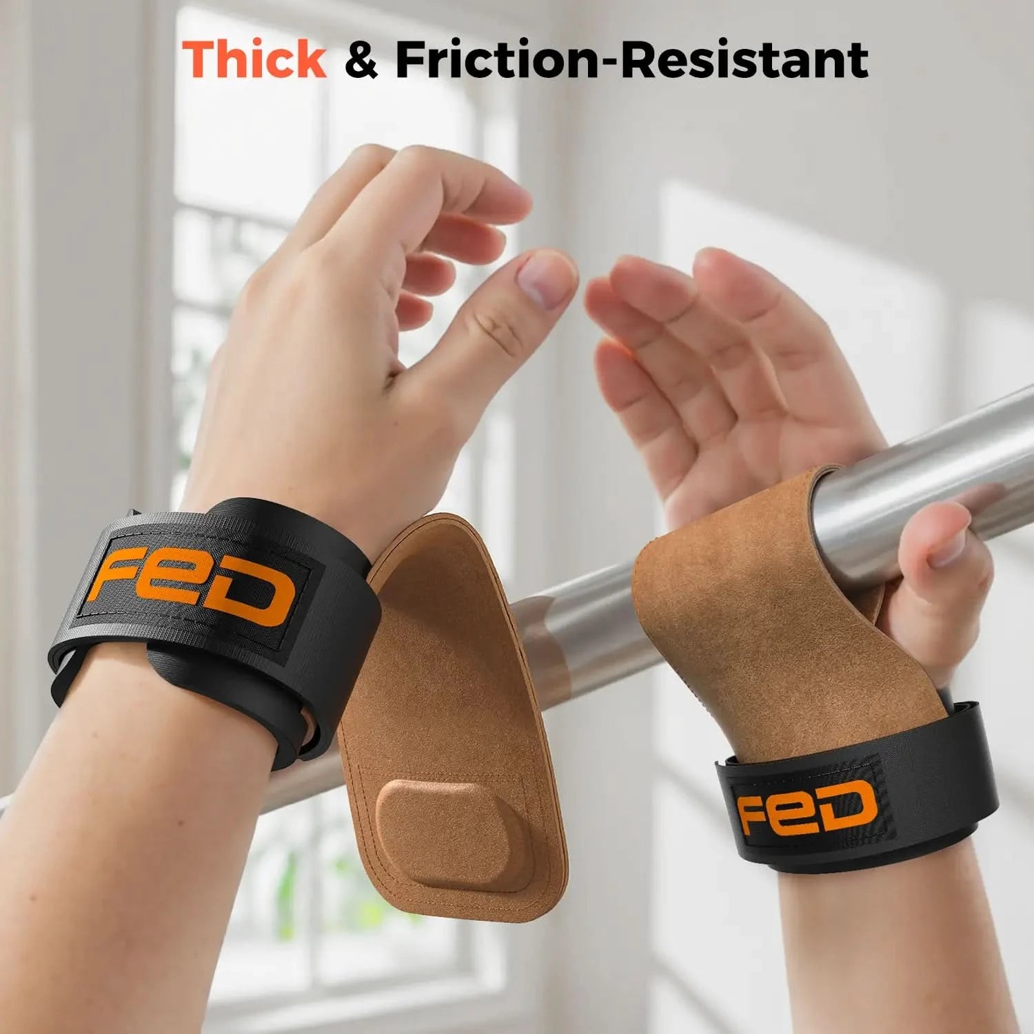 Hands wearing thick wrist straps with 'FED' branding, gripping a bar.