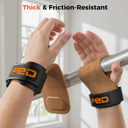 Hands wearing thick wrist straps with 'FED' branding, gripping a bar.