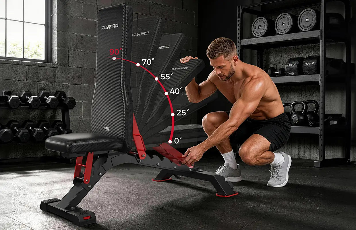 A man in workout clothes crouches beside a black and red adjustable weight bench in a gym, pointing to angle markings overlaid on the backrest. The bench has visible FLYBBRO branding and red adjustment accents.