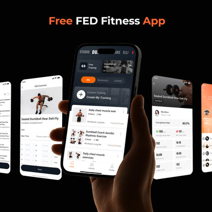 Hand holding a smartphone displaying the FED Fitness App with various workout screens.