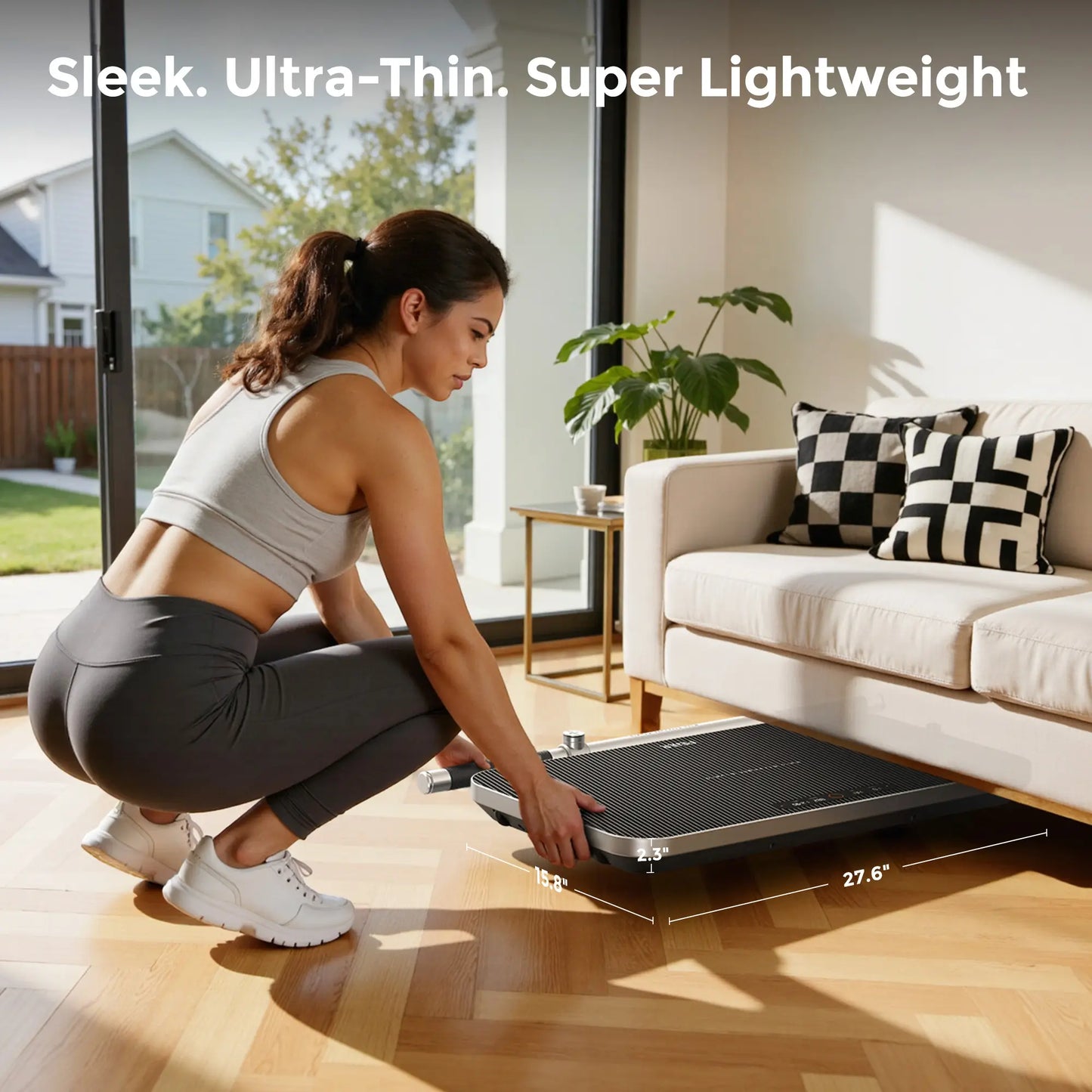Woman using a slim electronic device in a living room.