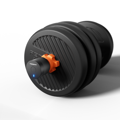 Black adjustable dumbbell with orange adjustment knob on a white background