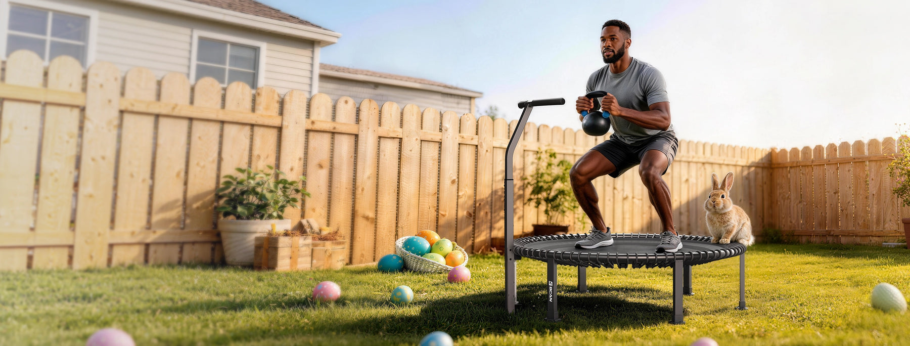 Man exercising on a trampoline in a backyard with a wooden fence and house in the background.