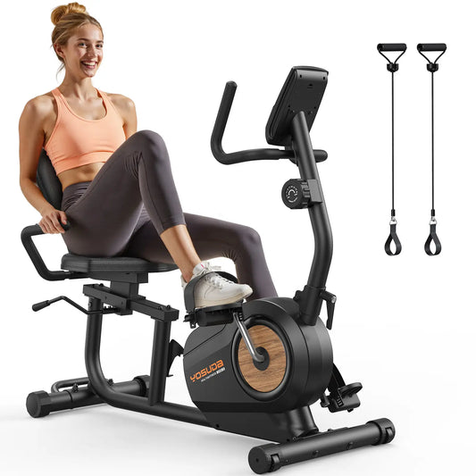 Woman using a exercise bike with resistance bands on a white background