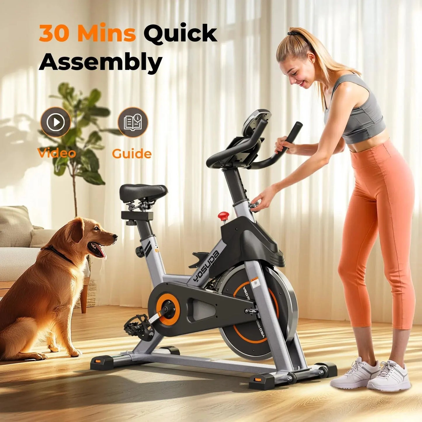 Woman assembling a stationary bike with a dog watching indoors.