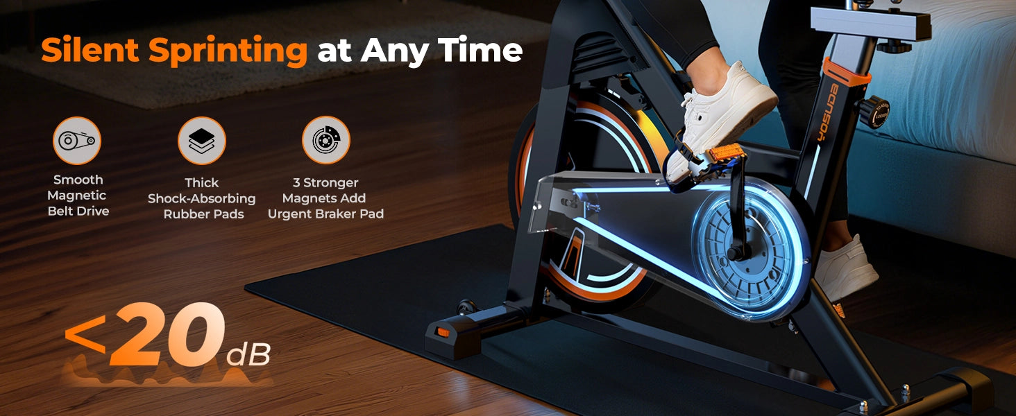 Home exercise bike with features highlighted on a dark background